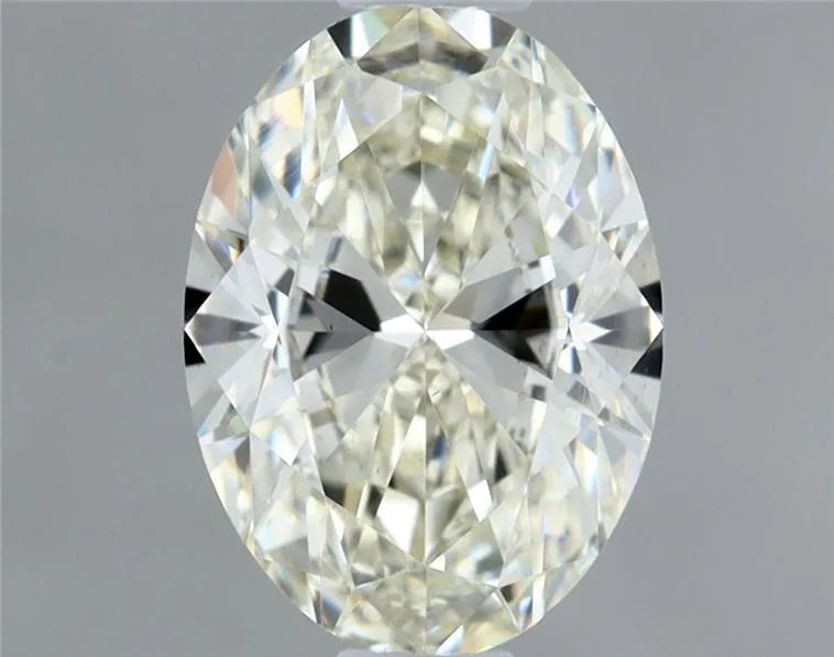 0.58ct Oval Natural Diamond (Colour J, Clarity VS2, Cut VG, IGI Certified)