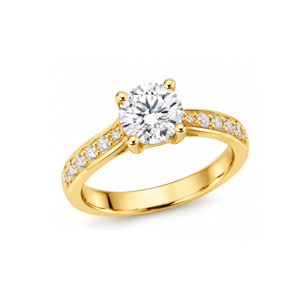 Jeweller carefully setting a diamond in a gold ring