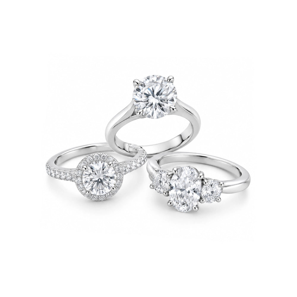 Jeweller carefully setting a diamond in a gold ring